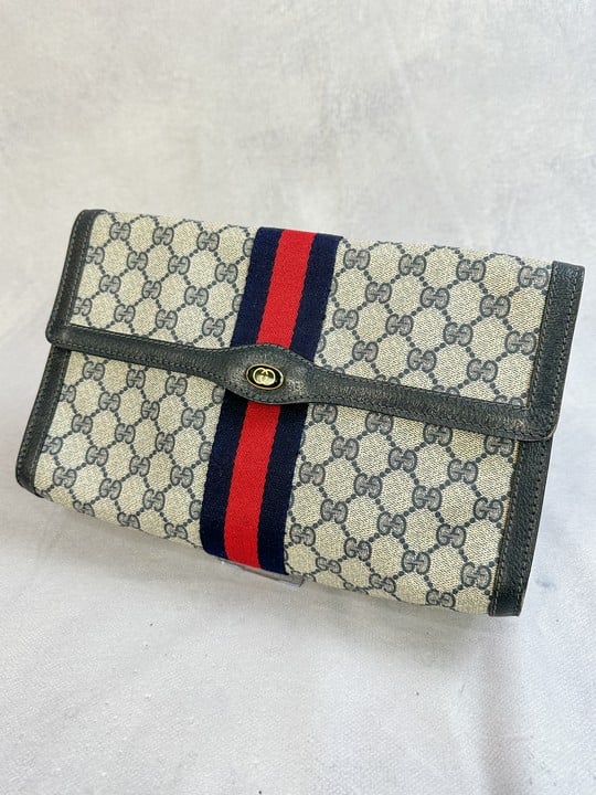 Gucci GG Canvas Sherry Line Clutch Bag, Dimensions 29x15x8.5cm(Approx) (VAT ONLY PAYABLE ON BUYERS PREMIUM)