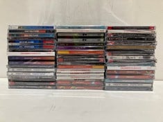 QUANTITY OF CDS VARIOUS ARTISTS INCLUDING ENNIO MORRICONE LOCATION 52B .