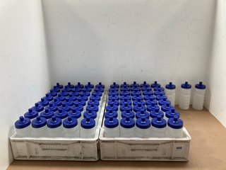 QTY OF CLEAR WATER BOTTLES WITH BLUE LIDS: LOCATION - J20