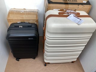 CABIN SIZE HARD SHELL WHEELED SUITCASE IN BLACK TO ALSO INCLUDE LONG VACATION SET OF 4 SUITCASES IN WHITE/BROWN: LOCATION - I4