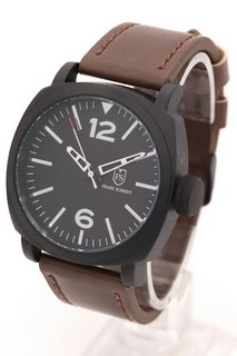 MEN'S FRANK SCHMIDT WATCH. FEATURING A BLACK DIAL, BEZEL AND CASE, W/R 3ATM. BROWN LEATHER STRAP. COMES WITH A PRESENTATION CASE: LOCATION - E0