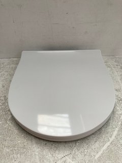 WHITE W/C SEAT - RRP £70: LOCATION - R4