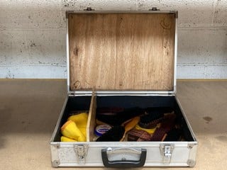 AN ALUMINIUM CASE CONTAINING VINTAGE SHOE SHINING EQUIPMENT. A 'SHINE BOX': LOCATION - BR10