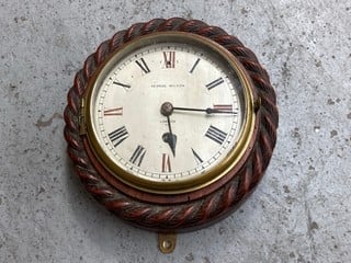 A GEORGE WILSON HEAVY ANTIQUE OAK WALL CLOCK: LOCATION - BR11