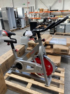 SUNNY HEALTH & FITNESS PRO CYCLING STATIONARY BIKE IN GREY/RED RRP £160: LOCATION - B6 (KERBSIDE PALLET DELIVERY)