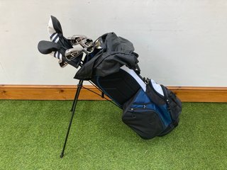 RIFE GOLF BAG IN WHITE BLACK & BLUE TO INCLUDE QTY OF ASSORTED GOLF CLUBS: LOCATION - C1