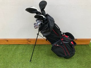 FAZER GOLF BAG IN RED WHITE & BLACK TO INCLUDE QTY OF ASSORTED GOLF CLUBS: LOCATION - C1