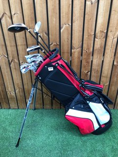 FAZER GOLF BAG IN RED WHITE & BLACK TO INCLUDE QTY OF ASSORTED GOLF CLUBS: LOCATION - C2