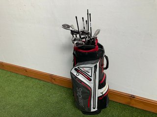 STROMBERG GOLF BAG IN RED WHITE & BLACK TO INCLUDE QTY OF ASSORTED GOLF CLUBS: LOCATION - C2