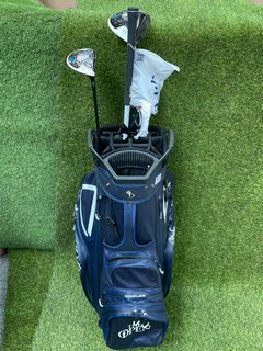 STROMBERG GOLF BAG IN BLUE TO INCLUDE QTY OF ASSORTED GOLF CLUBS: LOCATION - C4