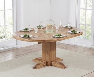 HELMSLEY/HOXTON 125/180CM OAK ROUND EXT TABLE - RRP £1099: LOCATION - D3