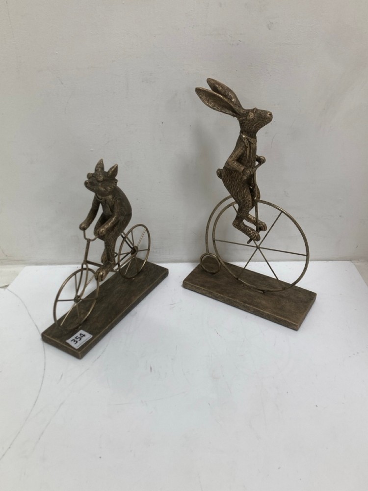 RABBIT AND FOX RIDING ON BICYCLES SET IN BRONZE EFFECT(COLLECTION ONLY)