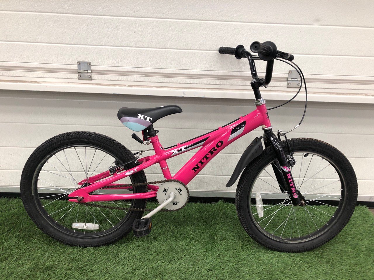 NITRO XT KIDS BMX, 12” FRAME, 202 WHEELS, SINGLE SPEED.: LOCATION - MIDDLE FLOOR(COLLECTION OR OPTIONAL DELIVERY AVAILABLE)