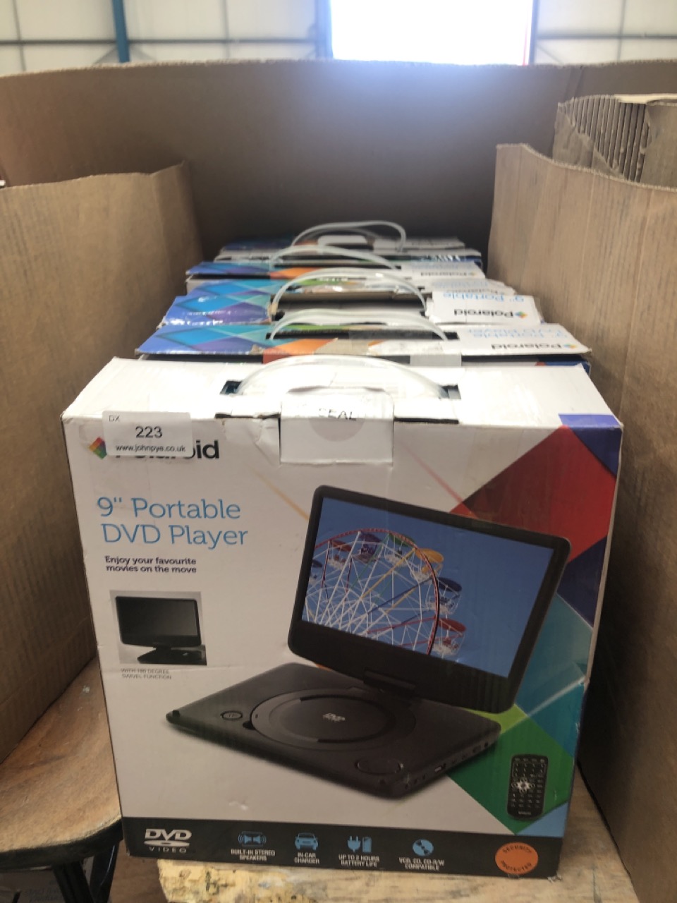 7 X POLAROID 9" PORTABLE DVD PLAYER: LOCATION - RIGHT REAR TABLES(COLLECTION OR OPTIONAL DELIVERY AVAILABLE)