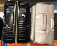 LARGE BLACK WITH RIDGES IT SUITCASE AND MEDIUM CREAM COLOURED IT SUITCASE WITH FABRIC OUTER LAYER: LOCATION - F