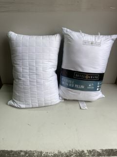 BOX OF WHITE PILLOWS