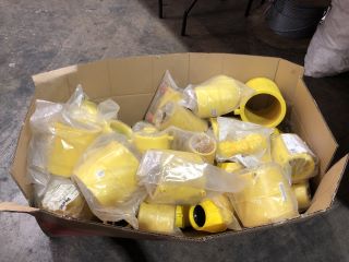 BOX OF YELLOW PLUMBING FITTINGS