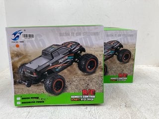 2 X RACING FULL OF POWER REMOTE CONTROLLED 2.46HZ RACE TRUCKS: LOCATION - F0