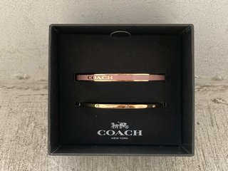 COACH 2 PACK BAND BRACELETS IN PINK AND PINK/GOLD RRP - £95: LOCATION - G15