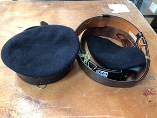 A COLLECTION OF VINTAGE MILITARY BERETS AND BELTS: LOCATION - CR