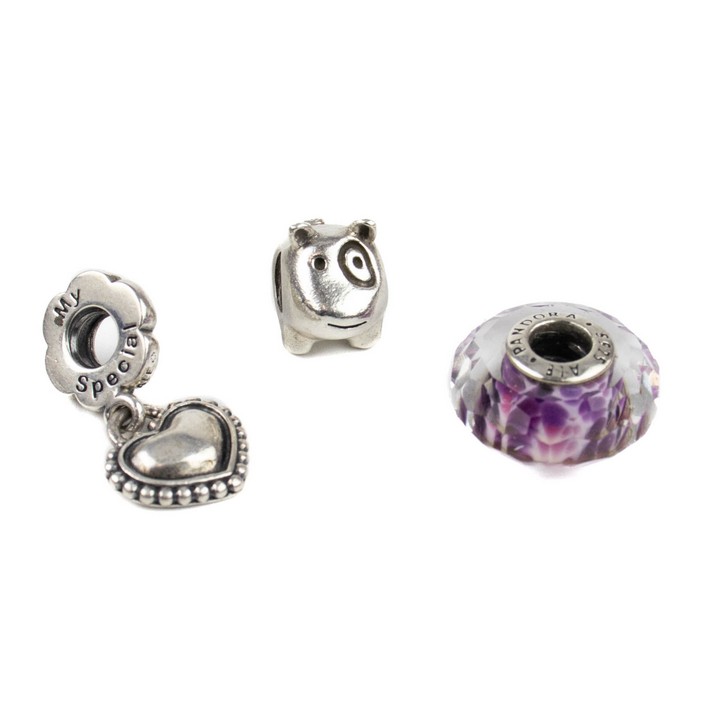 Pandora Silver Three Charms including Spot the Dog Puppy, Sister Heart Drop, White, Purple and Pink Glass Bead, total weight 10.9g (VAT Only Payable on Buyers Premium)