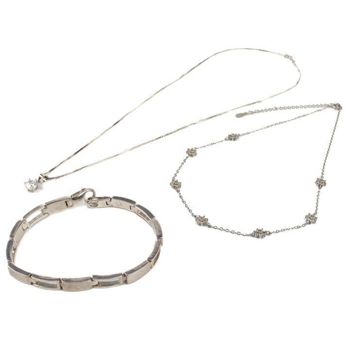 Silver Round Clear Stone Pendant and Chain, 45cm. Silver Clear Stone Seven Flowers Anklet, 33cm with 7cm Safety Chain. Silver Hinge Link Bracelet, 19cm, total weight 29.7g (VAT Only Payable on Buyers