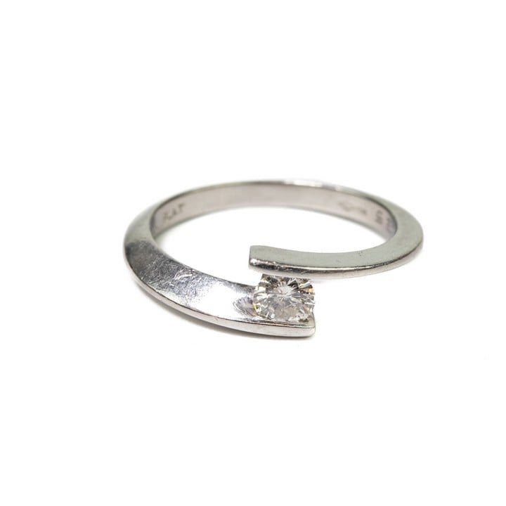 Platinum 950 0.25ct Diamond Single Stone Twist Ring, Size K½, 3.7g. Auction Guide: £100-£150 (VAT Only Payable on Buyers Premium)