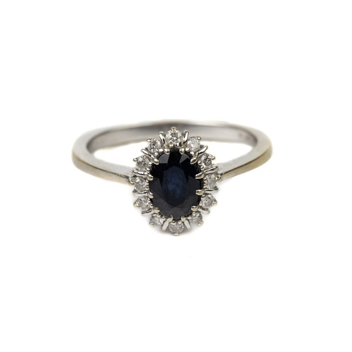 18ct White Gold Blue Stone with Diamond Halo Ring, Size M½, 2.9g.  Auction Guide: £150-£200 (VAT Only Payable on Buyers Premium)