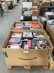 PALLET WITH LOTS OF BOOKS IN VARIOUS LANGUAGES INCLUDING COOKING AT HOME WITH JORDI CRUZ.