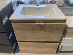 BATHROOM VANITY UNIT WITH TWO OAK-COLOURED DRAWERS.