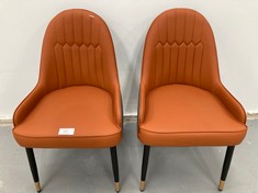 2 X MODERN STYLE ORANGE AND BLACK ARMCHAIRS (BROKEN).