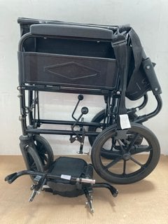 FOLDABLE WHEEL CHAIR IN BLACK: LOCATION - J17