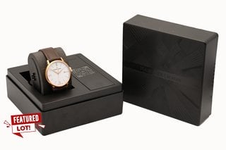 MAURICE LACROIX EL1118 MEN'S QUARTZ WATCH. FEATURING A WHITE DIAL, ROSE GOLD COLOURED BEZEL AND CASE, DATE, W/R 50ATM. BROWN LEATHER STRAP. COMES IN A PRESENTATION BOX - RRP £800: LOCATION - FRONT BO