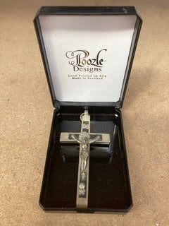 AN ANTIQUE WHITE METAL CRUCIFIX: LOCATION - AR9