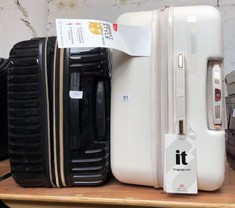 QTY OF ITEMS TO INCLUDE IT LUGGAGE HARD PLASTIC SUITCASE FULLY LINED 4XWHEELS (BLACK) + CREAM LARGE IT LUGGAGE SUITCASE FULLY LINED 4X WHEELS: LOCATION - TABLES