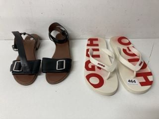 A PAIR OF SANDALS AND HUGO BOSS FLIP FLOPS