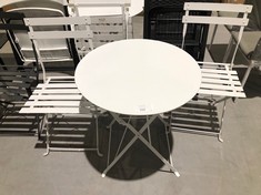 GARDEN SET COMPOSED OF TWO CHAIRS AND A ROUND TABLE IN WHITE COLOUR.