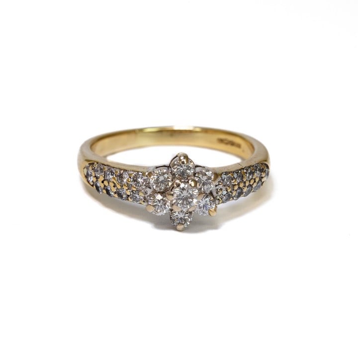 18ct Yellow and White Gold 0.63ct Diamond Flower and Shoulders Ring, Size T, 5.1g.  Auction Guide: £250-£350 (VAT Only Payable on Buyers Premium)