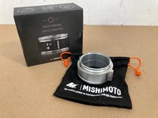 MISHIMOTO 3" QUICK RELEASE CLAMP ASSEMBLY IN CLEAR PART NO: MMCLAMP-QD-30CL TO INCLUDE MISHIMOTO WEIGHTED GRIPM SHIFT KNOB IN GOLD/BLACK PART NO: MMSK-BMX GDBK: LOCATION - A3