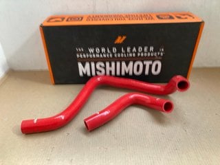 MISHIMOTO MITSUBISHI EVO 10 SILICONE BOV RETURN HOSE IN BLUE MODEL: MMHOSE-EVO-XBOVBL TO INCLUDE MISHIMOTO 94-01 HONDA INTEGRA SILICONE HOSE KIT IN RED MODEL : MMHOSE-INT-94RD: LOCATION - AR9