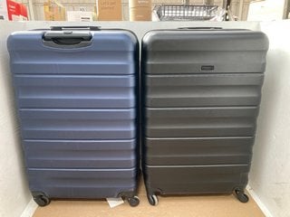 2 X JOHN LEWIS AND PARTNERS LARGE SIZED HARDSHELL TRAVEL SUITCASES IN NAVY AND BLACK: LOCATION - F17