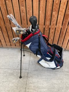 STROMBERG DRY 5 GOLF STAND BAG IN NAVY/RED AND WHITE TO INCLUDE QTY OF ASSORTED GOLF CLUBS: LOCATION - D7