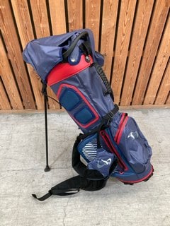 STROMBERG WEATHERLITE GOLF CADDY BAG IN NAVY AND RED: LOCATION - D7