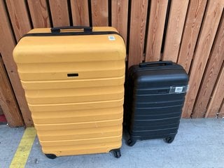 2 X JOHN LEWIS & PARTNERS HARD SHELL STYLE WHEELED SUITCASES IN YELLOW AND BLACK : SIZES LARGE AND SMALL: LOCATION - D6