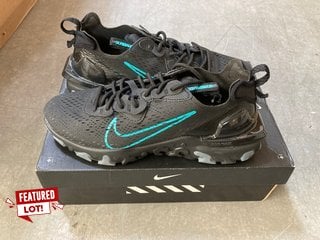 PAIR OF NIKE REACT VISION TRAINERS IN BLACK AND NEON TEAL : SIZE 8 UK - RRP £130: LOCATION - BR2