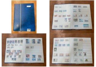 A STOCK BOOK OF VINTAGE INTERNATIONAL STAMPS: LOCATION - CR