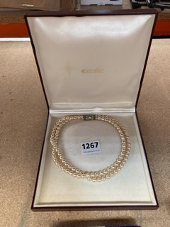 A DOUBLE STRING OF VINTAGE SIMULATED PEARLS, BOXED: LOCATION - CR