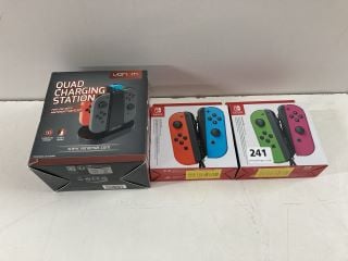 2 SETS OF NINTENDO SWITCH CONTROLLERS AND A CHARGING STATION