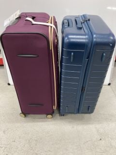 2 X LARGE SUITCASES (1 X SUITCASE DAMAGED IN CORNER)