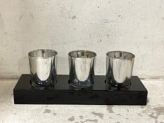 24 X STONE THE CROWS THREE SILVER VOTIVES ON PLINTH-LNG 25CM - TOTAL RRP £240